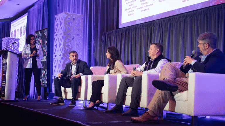 Panelists and speakers participating in a live conference session